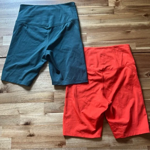 Medium Girlfriend Collective Bike Shorts In Orange and Dark Green - Picture 3 of 4